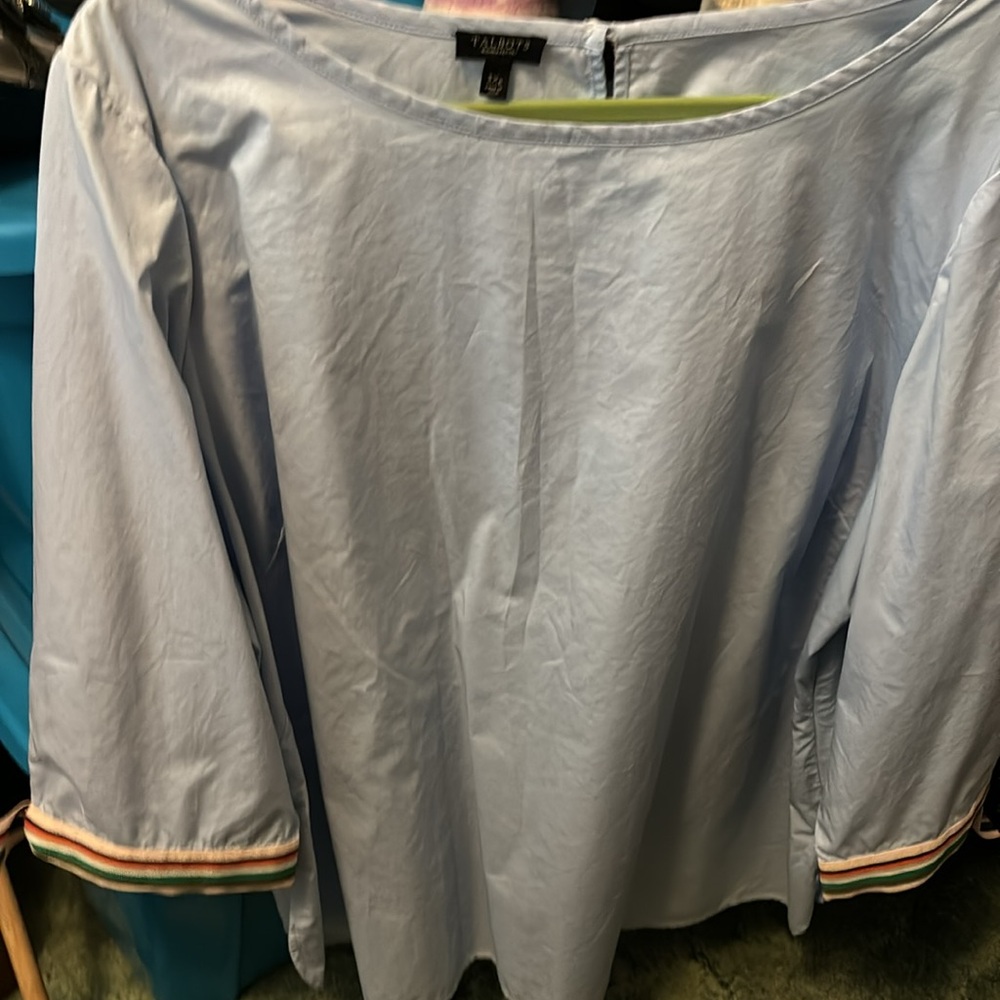 This top is 100% blue cotton and never worn.
